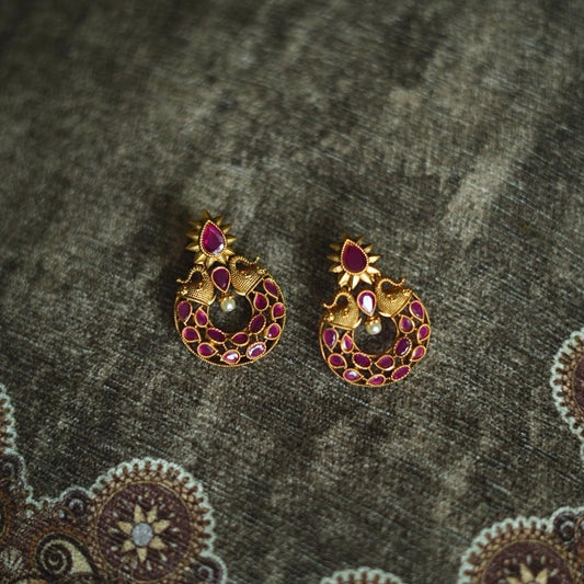 Temple drop earring